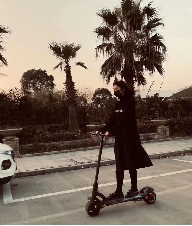 Folding Scooter — Wide Tires, Dual Drive